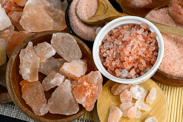 istock Himalayan salt - various types and sizes on a table - close up shot 2227679574