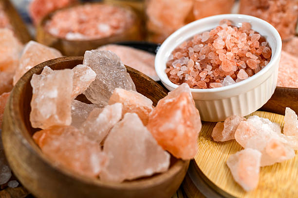 istock Himalayan salt - various types and sizes on a table - close up shot 2227679648