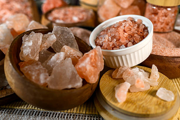 istock Himalayan salt - various types and sizes on a table - close up shot 2227679712