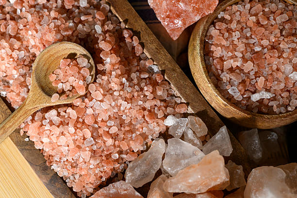 istock Himalayan salt - various types and sizes on a table - close up shot 2227679714