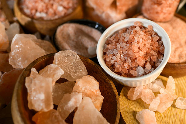 istock Himalayan salt - various types and sizes on a table - close up shot 2227679951