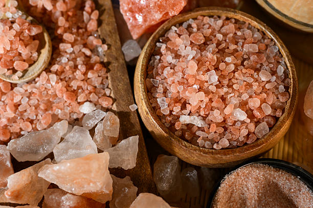istock Himalayan salt - various types and sizes on a table - close up shot 2227679952