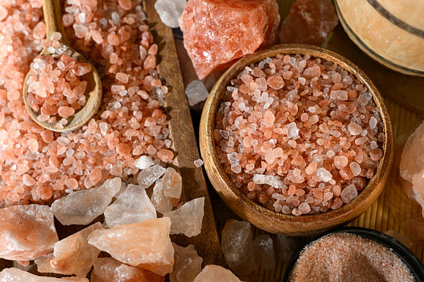 istock Himalayan salt - various types and sizes on a table - close up shot 2227680481