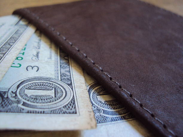 istock American dollar bills inside a leather wallet 2227680825