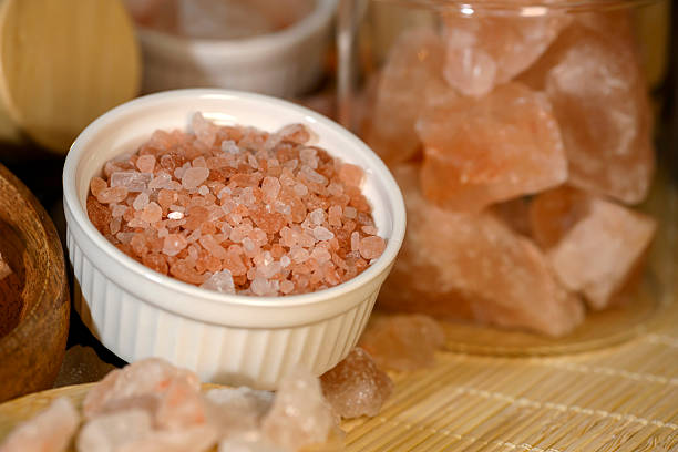 istock Himalayan salt - various types and sizes on a table - close up shot 2227680906