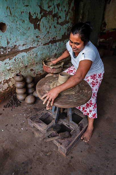 istock Lankan potter working in a workshop near Sigiriya town 2227682549