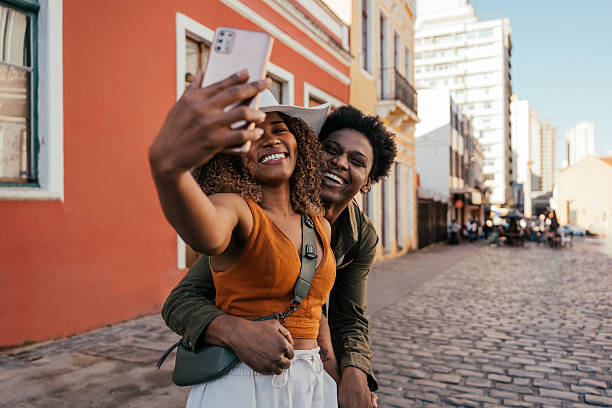 istock Young tourist couple taking selfie with smartphone 2227683321
