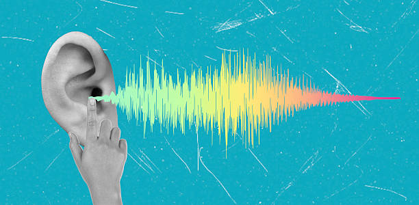 istock Art collage, Exploring sound waves and hearing with an ear and a finger on a vibrant blue background 2227699647