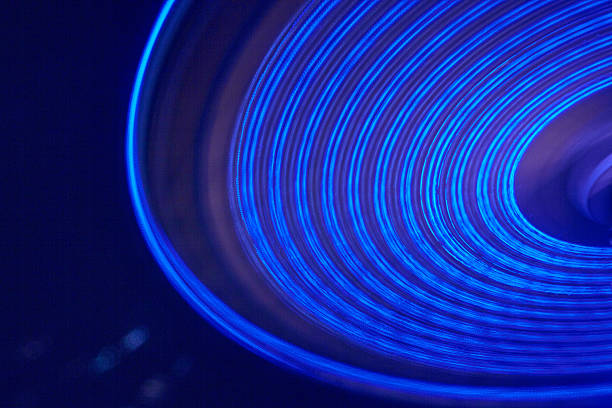 istock Infrared Vibrant Blue Light Trails at Amusement Park - Abstract Motion 2227703633