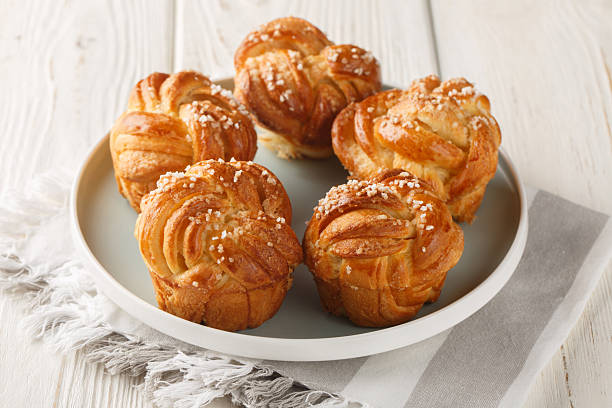 istock Homemade Knot sugar buns close-up in plate. horizontal 2227706340