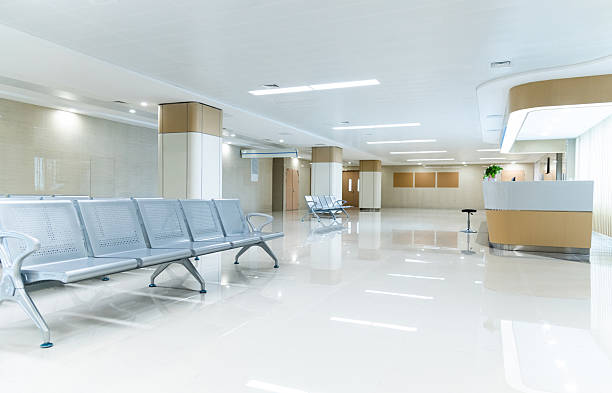 Hospital waiting room with many empty chairs