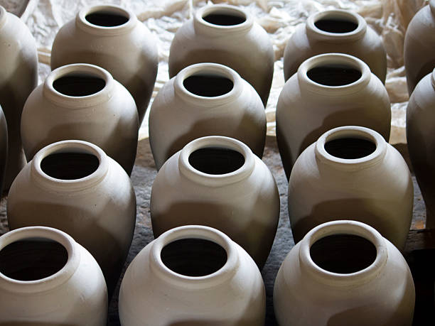 istock Unfinished clay pots drying 2227707080