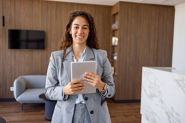 istock Confident businesswoman holding a digital tablet 2227707882