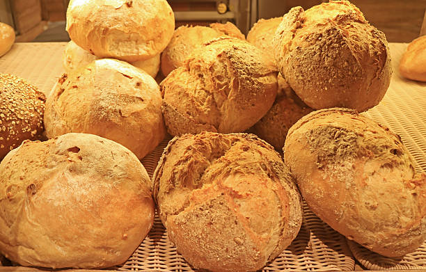 istock Freshly baked assorted breads in the bakery 2227718810