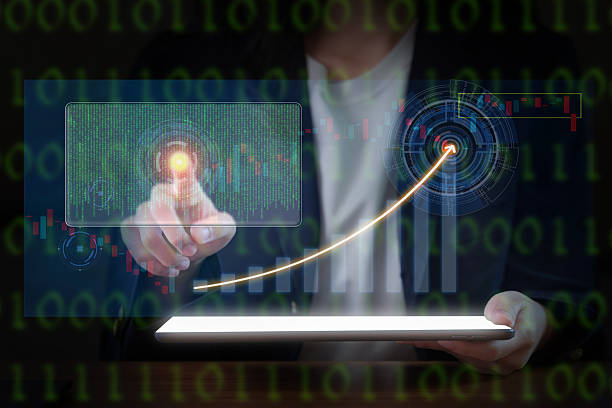 istock A woman in a business suit interacts with a virtual network. 2227723772