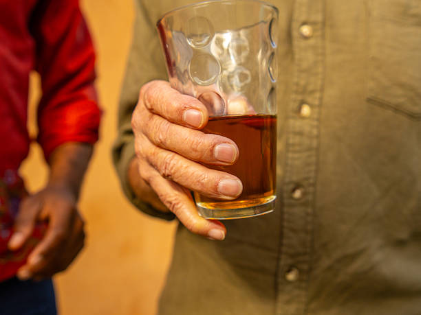 Diverse Adults Enjoy Different Beverages With Friends