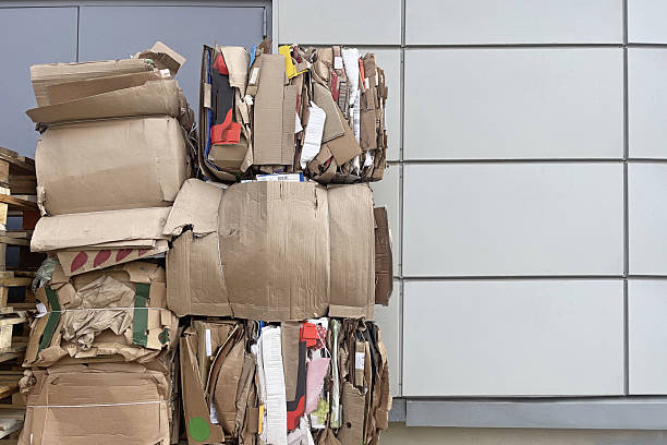 istock Old waste paper and cardboard, recycling material industry background 2227729749