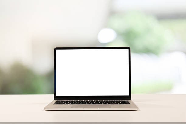 istock close up blank white screen display of laptop computer on table in office building with garden scene for add content of design banner,website or template or online shopping e-commerce concept 2227735503