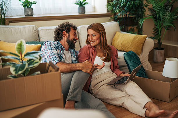 istock Happy couple planning new home interior design using laptop 2227739169
