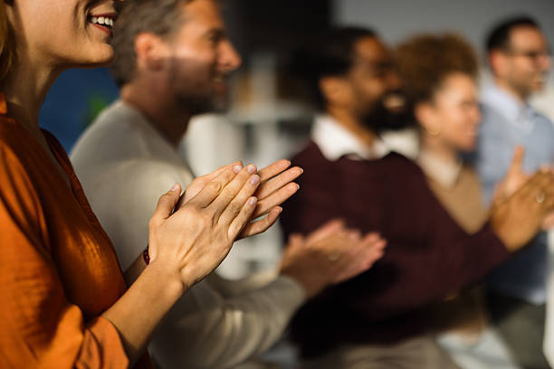 istock Business Team Clapping Hands and Celebrating Success in Office 2227739699