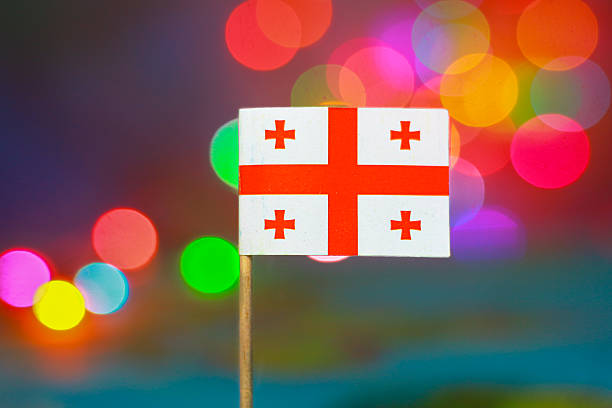 istock Georgia flag with vibrant artistic bokeh colors, symbolizing unity, independence, and celebration during national and Christmas events 2227741882