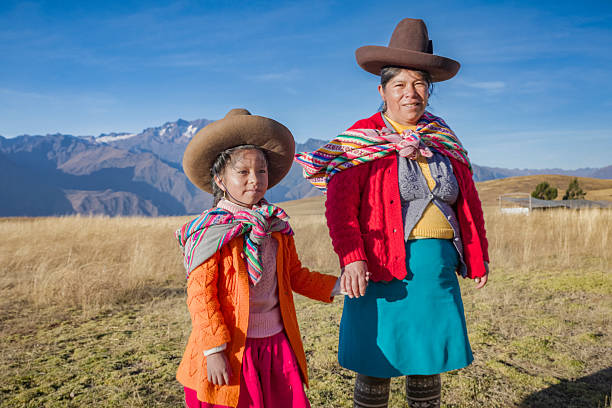 istock Peruvian woman crossing a field, Urubamba Valley 2227743803