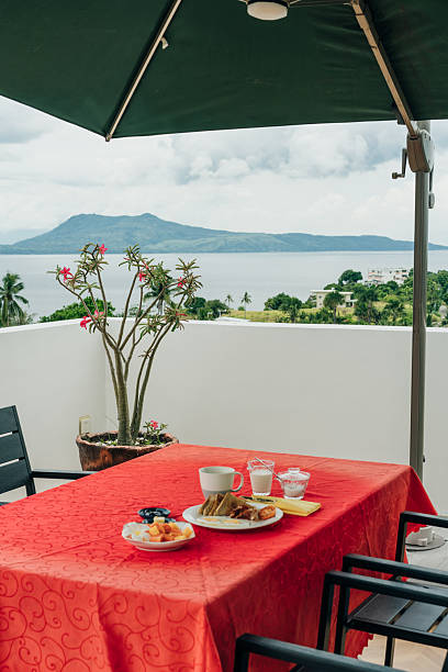 istock breakfast on a red tablecloth on the background of the ocean 2227746025