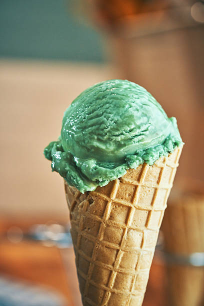 istock Pistachio Ice Cream in a  Cone 2227751185