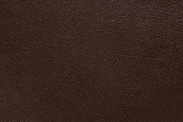 istock Dark brown grainy leather close up for backgrounds and design, cover 2227754056