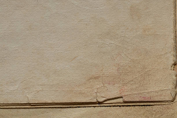 Old vintage paper sheets with texture and abrasions empty, top view, used as a background or template for design