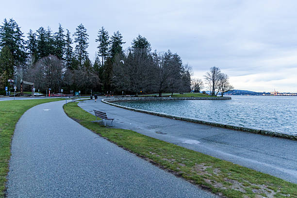 istock Peaceful Pathway by the Water at Stanley Park, Vancouver, Canada 2227761862