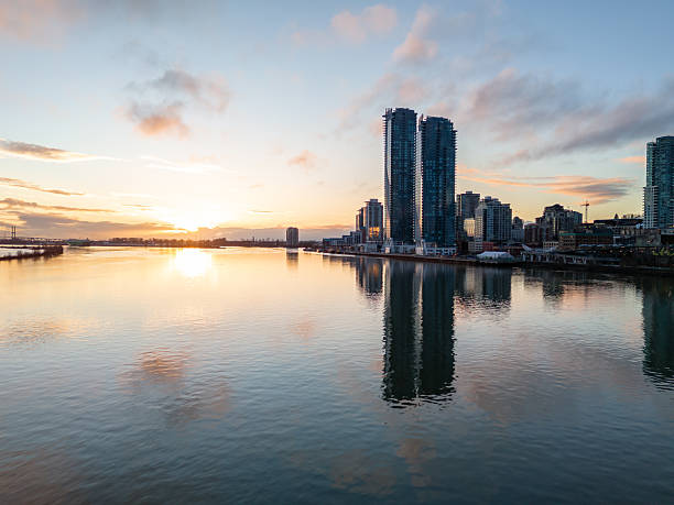 istock Beautiful River Sunset View with Skyline Reflections and Urban Landscape 2227761906