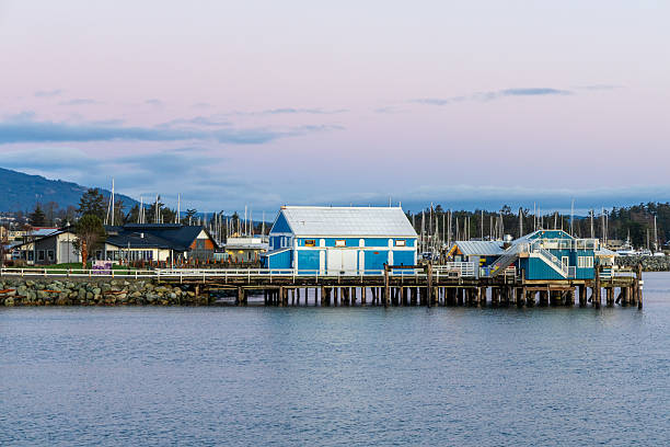 istock Scenic Waterfront Setting with Colorful Dock and Buildings in Evening Light 2227762027