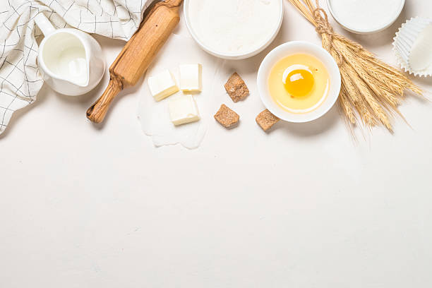 istock Baking background. Food cooking ingredients at blue table top view. 2227763895