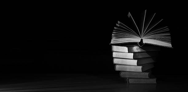 istock open book and stack of books,reading, education, knowledge is power concept. 2227772794