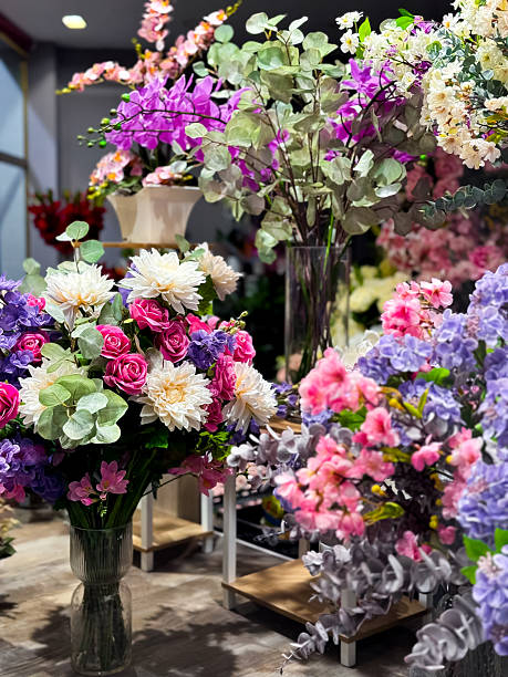 istock Vibrant floral display featuring roses, lilies, and eucalyptus in a colorful indoor setting 2227775160