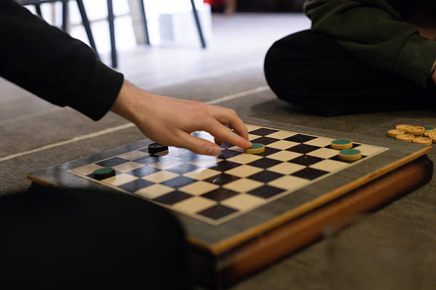 Strategic Checkers Move in Natural Light