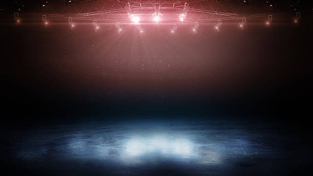 istock Blue ice. Dynamic rink background. Action sport background. Red bright lighting with spotlights. Ice floor texture and mist. Snow and ice background 2227781286