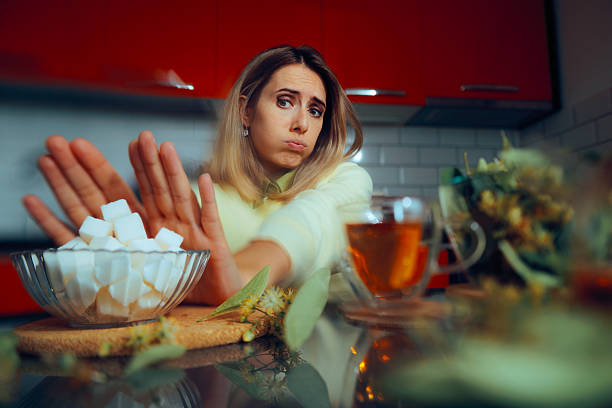 istock Woman Saying No to Sugar Drinking Unsweetened Tea 2227781794