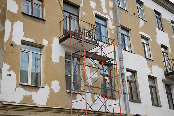 Reconstruction of the facade of a listed half-timbered house in a historic downtown in Germany.