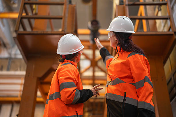 istock Workers & Industry. Women Engineers in Manufacturing Sector 2227783574