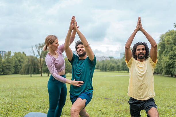 istock Outdoor Yoga Session with Diverse Participants 2227785730