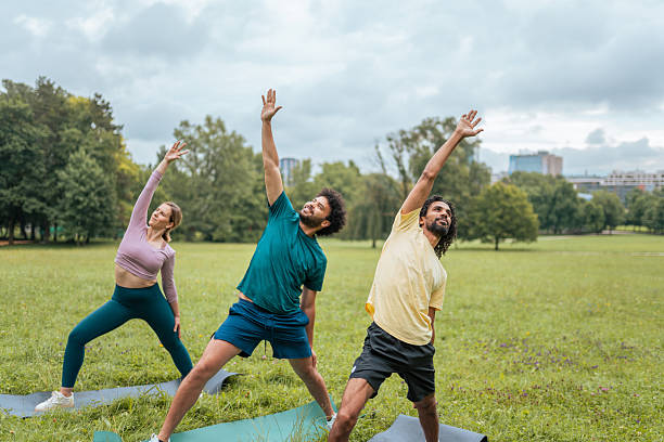 istock Diverse Yoga Group Engages in Outdoor Exercise 2227785734