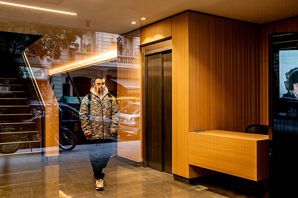 Young man leaving apartment
