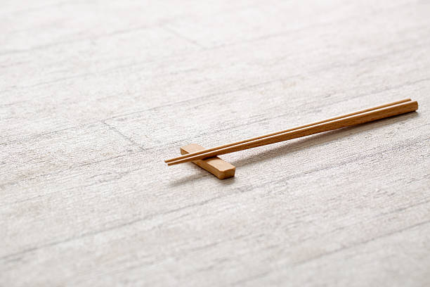 istock Chopsticks on the table, Japanese food served 2227791902