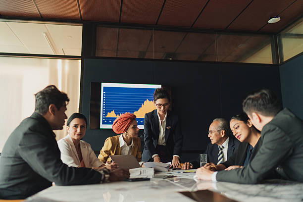 istock Group of multi racial white collar professionals in a meeting 2227792837