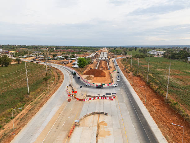 istock The construction site before the construction of the concrete bridge over the intersection by crane workers, tractors, and backhoes 2227798715