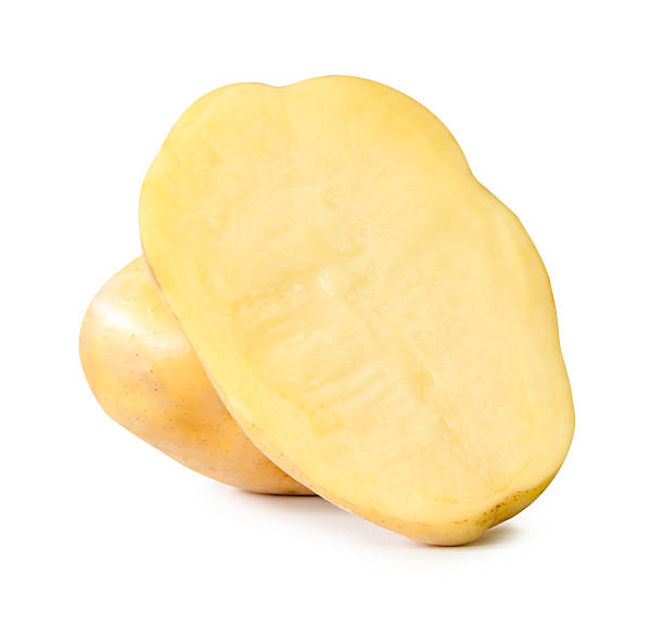 istock Raw potato with half in pile isolated on white background with clipping path 2227802289