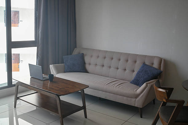 istock Minimalist Warmth: Contemporary Couch Styled for Relaxation 2227809873