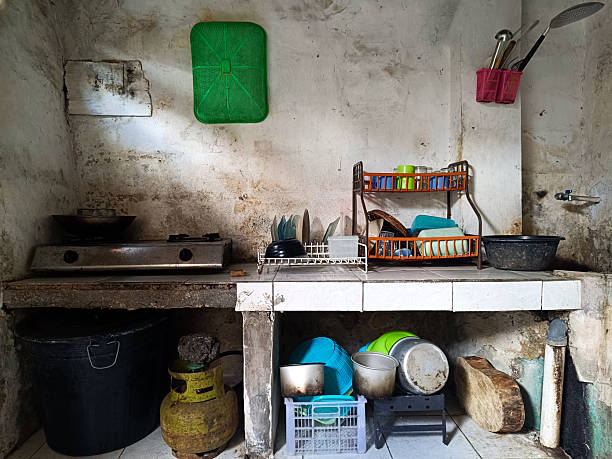 istock The kitchen is simple and worn with cooking and eating utensils. 2227809906